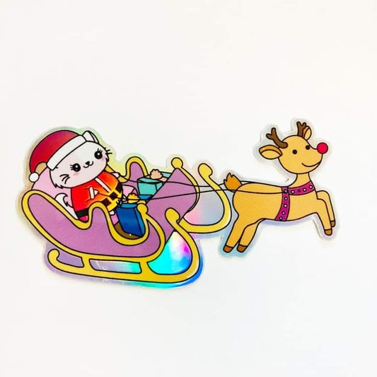 Santa Flora flying her Christmas Sleigh Holographic Vinyl Cat Decal Die Cut Sticker